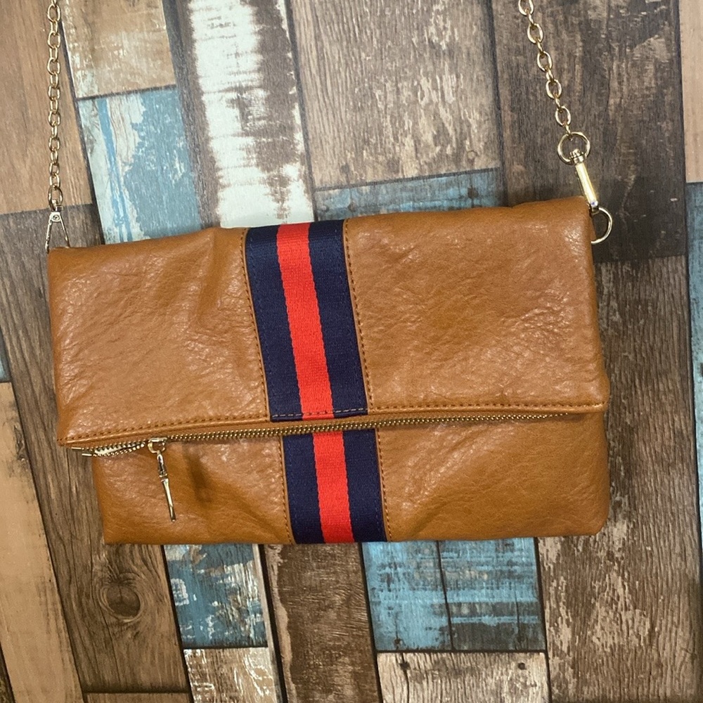 Soft foldable crossbody purse with gold chain strap and red stripe